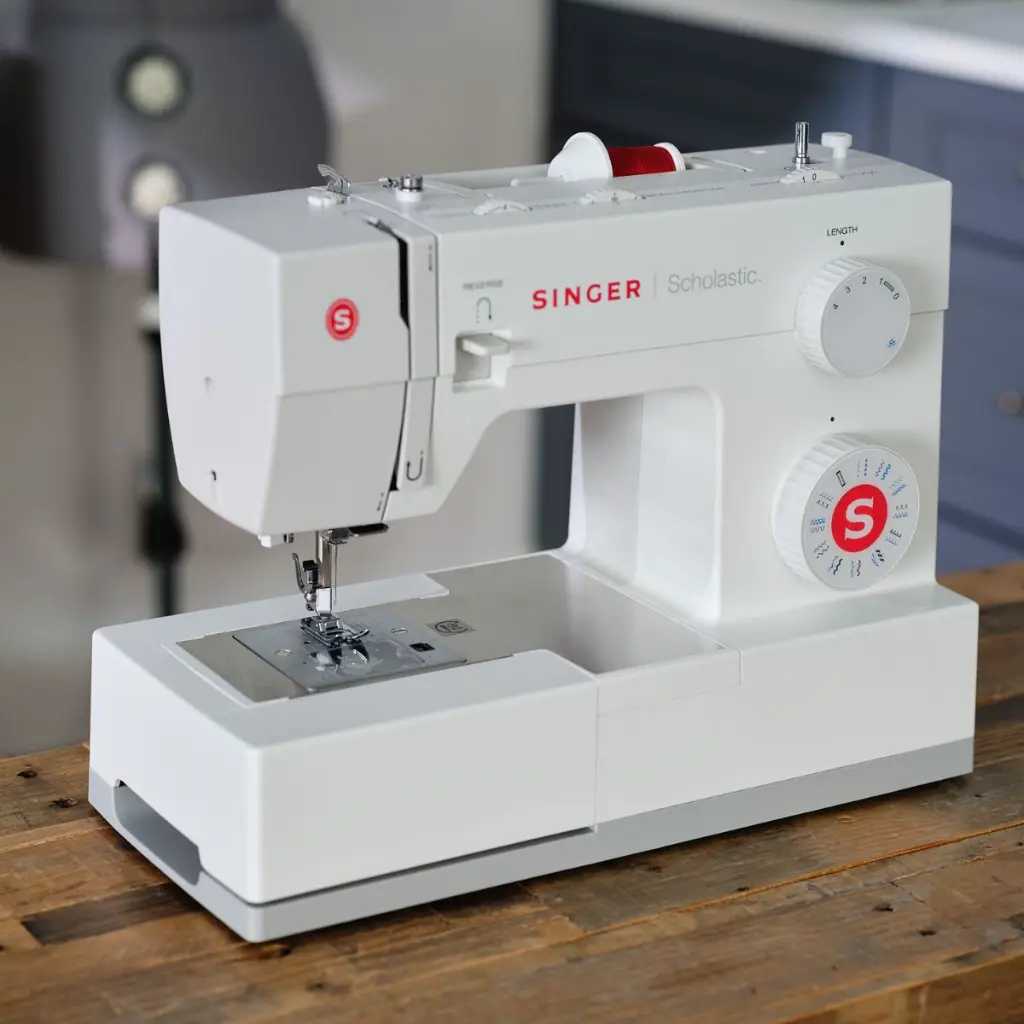 5523-singer-domestic-sewing-machine-on-wooden-table.webp